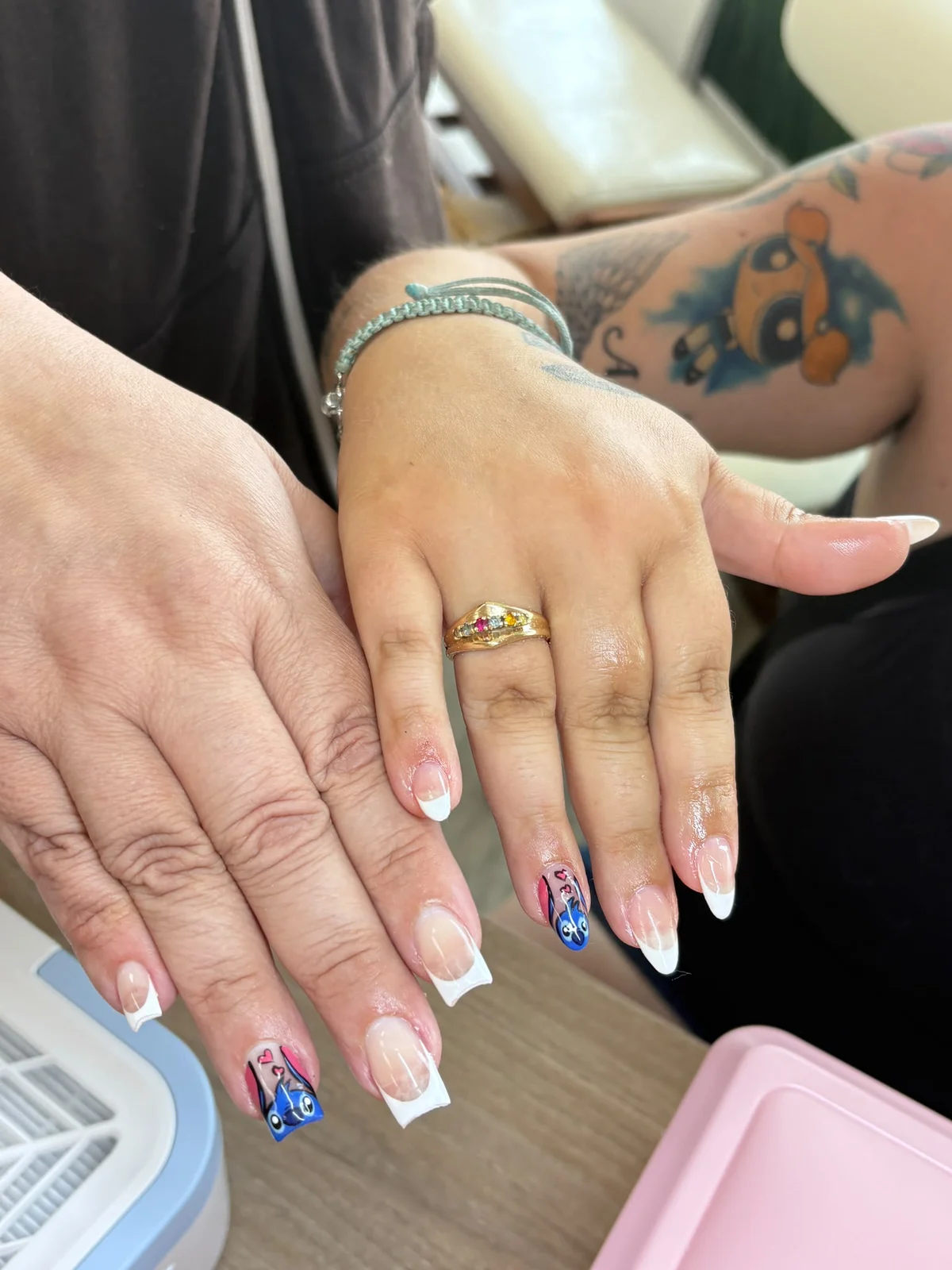 White French manicure with colourful character accent nails by The Hestia Nail Bar