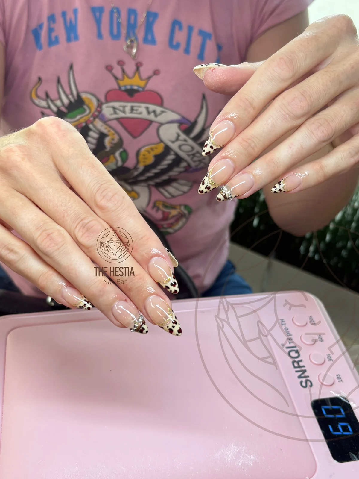 Almond leopard French manicure with gold accents by The Hestia Nail Bar